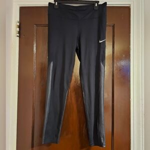 Nike Women's Faux Leather / Mesh Leggings